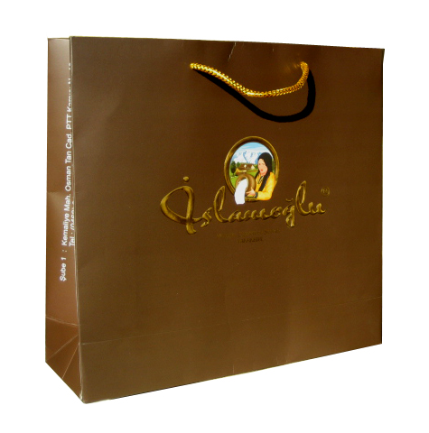 230 gsm Art Paper + 4 colour Photographic Print + Matt Lamination + Logo Embossing + Gold Foil Stamp + Gold Metalic Macrome Handle